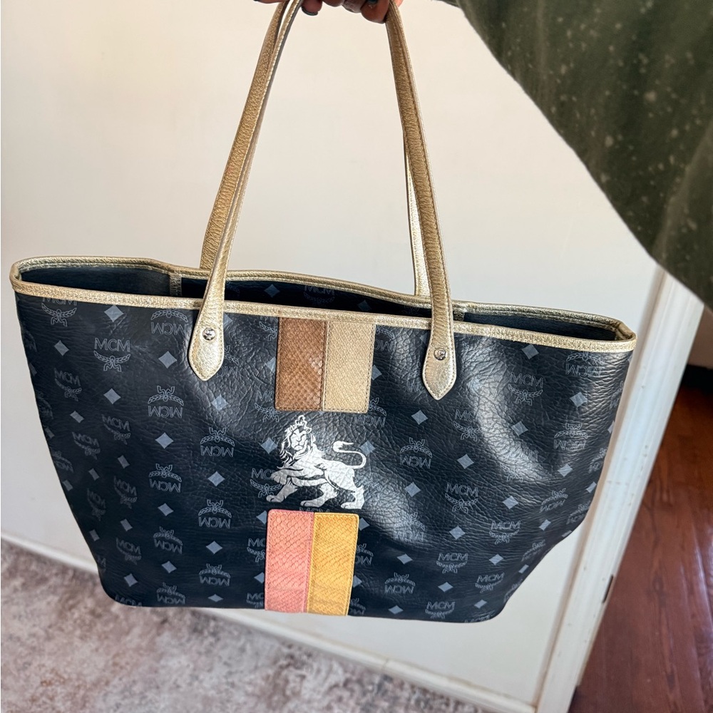 MCM Black Logo Tote with Metallic Gold Handles and Multicolor Stripe